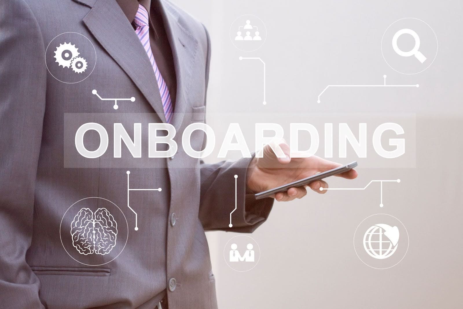 Man in suite with purple tie holding and iPad for onboarding